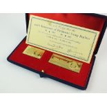 A cased pair of 18ct gold stamp replicas to commemorate the 700th Anniversary of Parliament, No.