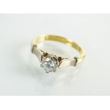 An 18ct single stone diamond ring,