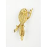 A ruby set bird brooch,