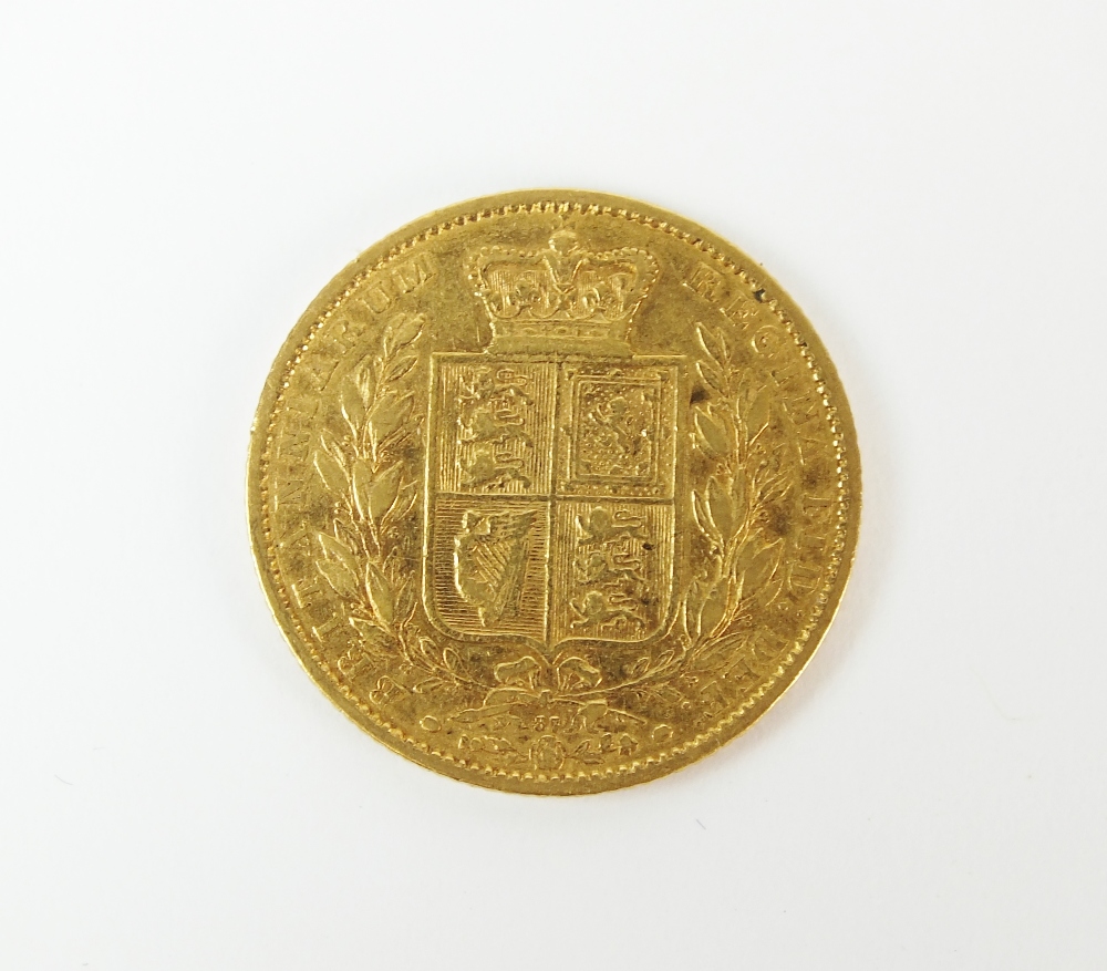 A Victoria shield back sovereign, dated 1864,