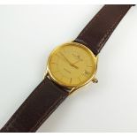 A Gentleman's 18ct gold Baume and Mercier quartz wristwatch,