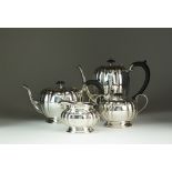 A four piece silver tea and coffee service, Barker Brother Silver Ltd, Birmingham 1937,
