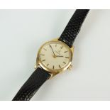 A Lady's 9ct gold Omega wristwatch, the silvered dial with batons, manual wind,
