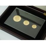 A 2011 Jersey gold three coin sovereign set, comprising; £5, £2 and sovereign,