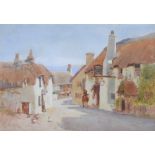 Albert Ernest Brockbank (1862-1958) Village Street with the sea beyond, signed lower left,