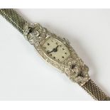 A Lady's diamond set cocktail watch, the case stamped 'Plat',