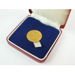 An Elizabeth II sovereign, dated 1979,