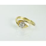 An 18ct gold single stone diamond ring,