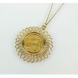 A sovereign set pendant, dated 1905, within 9ct gold mount and suspended from chain,
