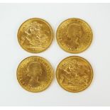 Four Elizabeth II sovereigns,