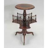 A Victorian walnut pedestal occasional table, with galleried rotating shelf,