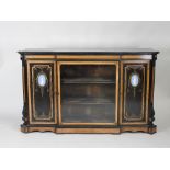 A Victorian ebonised amboyna banded breakfront credenza,