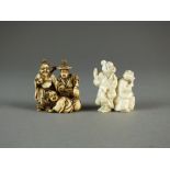 Two Japanese ivory netsuke, Meiji period, the first modelled as three immortals, signed Yoshiyuki,