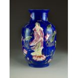 A Chinese powder blue ground famille rose vase, Qianlong seal mark but later,