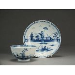 A Caughley tea bowl and saucer painted with the Girl with Parasol pattern, circa 1788-85, S mark,