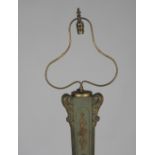 A 20th century Empire style painted and gilt highlighted lamp standard of tapering form on tripod