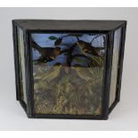 A late Victorian table top case of taxidermy birds, the four birds within a naturalistic setting,