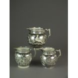 Three English pearlware silver lustre jugs, early 19th century, one named and dated 'Hannah Ivens,