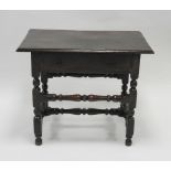 An early 18th century style oak single drawer side table,