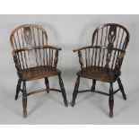 Two closely matching 19th century low ash and elm Windsors each with a pierced back splat over a