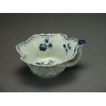 A rare Caughley leaf dish butter boat painted in the Gooseberry pattern, circa 1776-80,