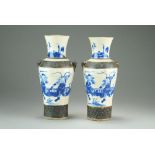 A pair of Chinese blue and white guan-type vases, late Qing Dynasty,