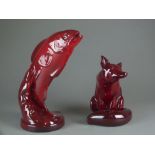 A Royal Doulton flambe fox and a Royal Doulton flambe fish, printed factory marks,