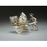 A Chinese silver figural condiment set by Zee Wo, Shanghai 1875-1925,