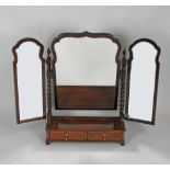 An early 20th century mahogany triptych dressing mirror of country house proportion the central