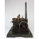 A large Marklin table top steam plant, early 20th century, mounted on a base of 35cm,