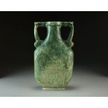 A large mottled green and white jade vase, late Qing Dynasty,