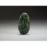 A Chinese dark mottled green jade pendant, late Qing Dynasty,