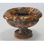 A late 18th / early 19th century continental variegated faux marble terracotta low campana urn,