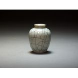A Chinese miniature Guan-type vase, Qianlong seal mark and probably of the period,