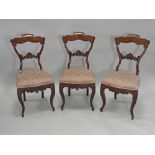 A set of six late 19th century mahogany Louis XV style salon side chairs with shell moulded back