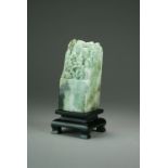 A mottled green jadeite boulder carving, late 20th Century,