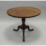 A George III mahogany tilt top supper table,