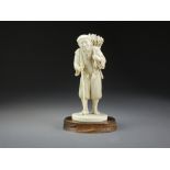 A good Japanese ivory figure of a peasant by Sosei, Meiji period,