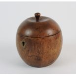 An 18th century style fruitwood tea caddy in the form of an apple the hinge lid opening to reveal a