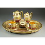 A Vienna porcelain cabaret coffee service painted with Greek Classical scenes,