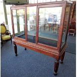 A late Victorian mahogany floor standing retailers display cabinet,