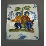 A 19th century rectangular Prattware plaque decorated in relief with pair of mythical creatures or