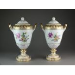 A large pair of Berlin porcelain vases and covers, 19th century,