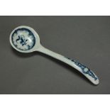 A Caughley spoon, circa 1776-80, printed with a floral roundel,