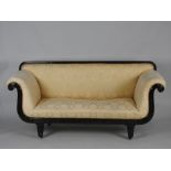 A William IV mahogany double scroll end chaise longue/day bed later covered in a gold Damask style