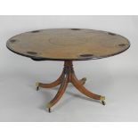 A George IV style mahogany tilt top pedestal gaming table,