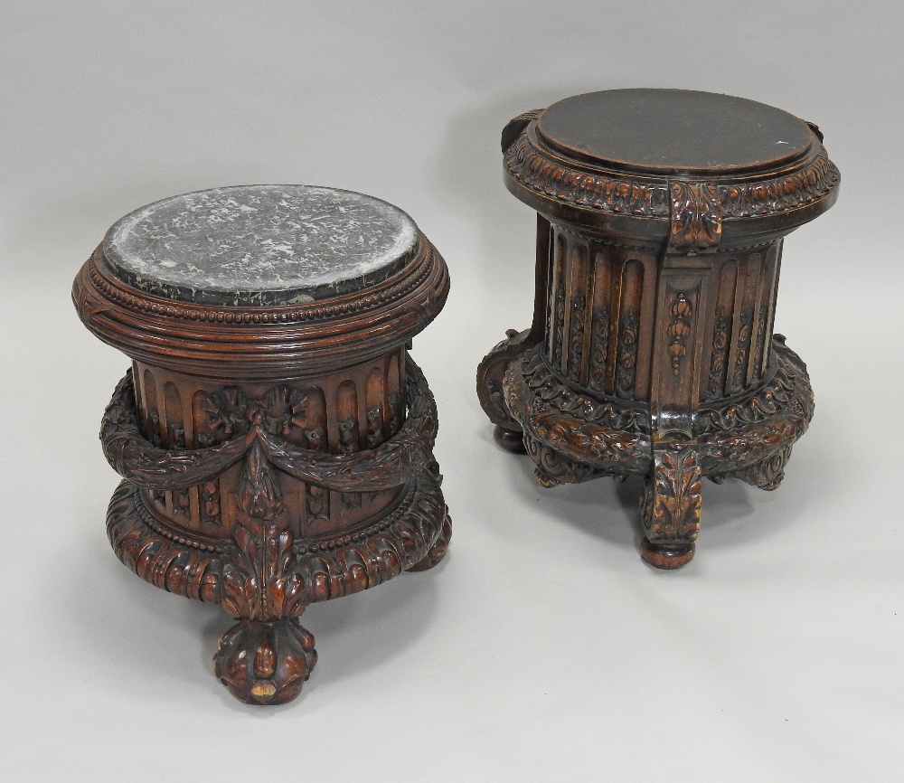 Two Empire style mid brown stained carved short pedestals,