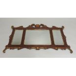 An 18th century style mahogany and giltwood landscape mirror,