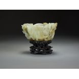 A Chinese grey-green jade libation cup, Qing Dynasty,