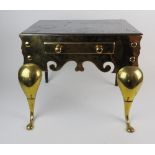 A 19th century polished steel and brass footman the rectangular top over a false drawer front and